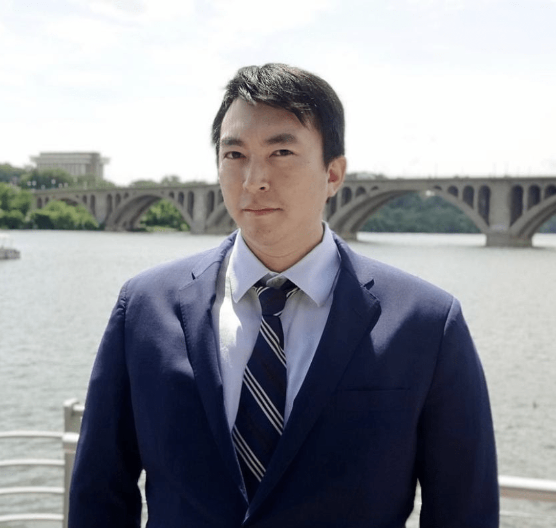 professional headshot of Jeffrey Kuo in a suit